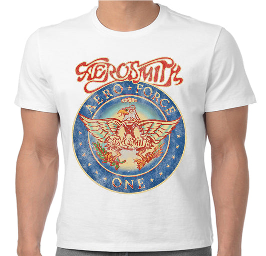 An official white aerosmith t shirt with  the band's logo and a round seal style graphic with aero force one surrounding an eagle on the front